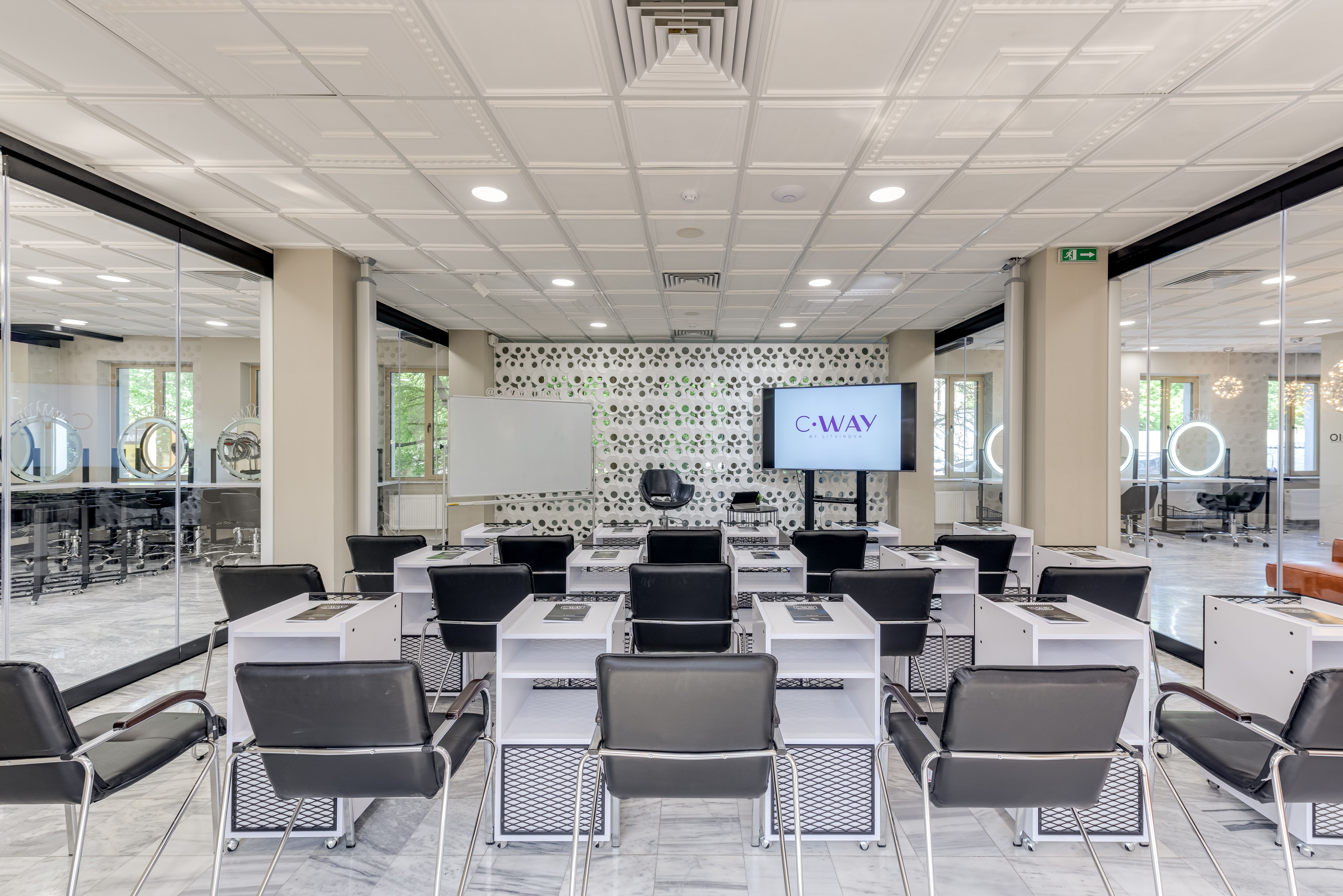 Spacious conference room featuring modern design, ideal for business meetings and presentations.